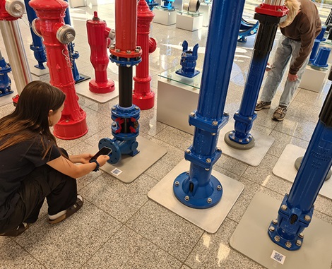 School children looking at gate valves at AVK